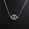 Detail of silver skull pendant with blue and clear zircon stones on a box chain necklace - Skull Style 3 White Gold