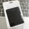 Adhesive black glitter phone card holder with dual slots in frosted zipper packaging - Fine Glitter Black