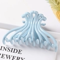 Light blue geometric hair claw clip in a wave design on a minimalist white surface - 10.5CM Large / Blue
