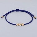 Deep blue handmade woven bracelet with matte golden irregular beads and adjustable cord - Dark Blue