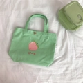 Grüne Canvas-Lunchtasche mit Pfirsich-Print und passender grüner Brotdose dazu - Minzgrüner Pfirsich