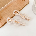 Set of two heart-shaped pearl hair clips with elegant gold-tone metal base settings - Summer 2-Piece Set