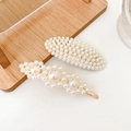 Elegant gold-tone hair clips with faux pearls in oval and wavy shapes for women - Time Space 2-Piece Set