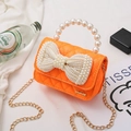 Orange quilted mini handbag with large pearl bow decoration and golden chain strap - Horizontal Orange
