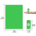 Green biodegradable dog poop bags showing unfolded 13x9 inch size and roll dimensions - 1.5 Microns Biodegradable Green