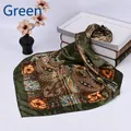 Close-up of a 90cm square silk scarf featuring dark green paisley patterns on books - Army Green