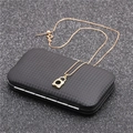 Close-up of a golden padlock pendant necklace with micro-pave zircons on a black jewelry box - Micro Pave Pave Lock - Gold