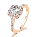 Macro shot of rose gold engagement ring with round zircon in a square halo setting - Square Shape Rose Gold White Stone / Size 9.5
