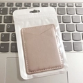 Slim light brown PU leather phone card holder with diagonal slot in packaging - Nappa Rose Gold