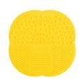 Lemon yellow silicone makeup brush cleaning pad with suction cup and varied textures - Yellow