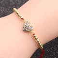 Bracciale a cordoncino rosso con perle dorate e ciondolo a cuore in zirconi colorati - Corda Rossa Perline di Rame + Cuore Stile 1