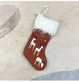 Dettaglio di una piccola calza di Natale con motivi di renne e risvolto in finta pelliccia - Piccolo / Rosso