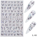 Macro shot of 3D holographic silver butterfly nail art stickers on white manicure tips - Laser Silver Butterfly (L03)