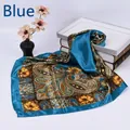 Detail of blue paisley print silk scarf with satin finish and vintage bohemian pattern - Blue
