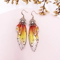 Macro detail of red and yellow gradient cicada wing earrings with sparkling rhinestones - Orange Rhinestone-Bronze