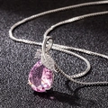 Silver necklace featuring a pink teardrop gemstone and leaf-shaped zircon pendant decoration - Pink Teardrop Pendant