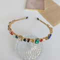 Baroque gold headband with multi-colored crystals in emerald, ruby, and navy blue - Colorful