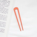 Minimalist orange U-shaped hair pin in matte finish for elegant bun hairstyling - Orange
