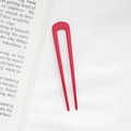Minimalist red U-shaped metal hair pin hair clip accessory on a white fabric background - Red