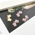 Pendentifs nœuds en émail violet avec bordure dorée pour création de bijoux DIY - Violet
