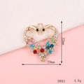 Macro detail of heart swan brooch with colorful rhinestones, size 32mm by 29mm, model D893 - D839 Double Peacock (Swan Style)