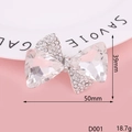 Macro shot of silver bow pendant with clear crystals and rhinestones, 50mm x 39mm size - D001 Triangular Crystal Bowknot (White)