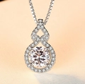 Silver teardrop necklace with round moissanite pendant and pavé set accents - Q016 Gourd Teardrop 1ct