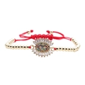 Macro detail of red woven chain bracelet featuring a gold zircon evil eye charm - Red Rope Bead Chain Evil Eye - Style 5