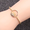 Goldenes Perlenarmband mit türkischem Evil Eye und bunten Zirkonsteinen am Handgelenk - Schwarzes Seil Perlenkette Teufelsauge Gold