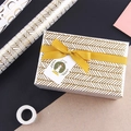 Golden chevron gift wrapping paper with a yellow ribbon and a joy tag on a gift box - 50x70cm / Simple Gold Line Stamping