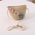 Close-up of summer straw bag for girls with 3D fabric flowers and secure metal zipper - Jeweled Flower Style / Beige