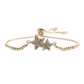 Macro detail of star bracelet with vibrant multicolored cubic zirconia and sliding chain - Gold Box Bead Chain