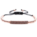 Detail of rose gold beads and micro-set black zircon tube on woven cord bracelet - Rose Gold Curved Tube