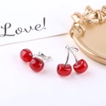 Detail of red acrylic cherry pendants with silver stems for DIY jewelry making - Red