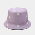 Detailed close-up of white daisy embroidery on a lavender cotton canvas bucket hat - Reversible Purple / M(56-58cm)