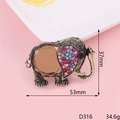 Macro view of vintage bronze elephant brooch with crystal inlay and 53mm size specs - Antique Bronze Gemstone Elephant