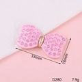 Pink rhinestone bow jewelry piece with enamel finish and gold edges, 33mm x 18mm size - D280 Pink Painted Bowknot (Large)