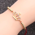 Bracelet couronne dorée avec zircons multicolores et corde rouge pour femmes et hommes - Corde Rouge Chaîne à Billes Couronne 1