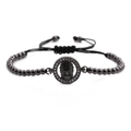 Herenarmband met zwarte kralen, zirkonia schedel en verstelbare gevlochten koord - Zwart