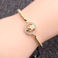 Pulsera de calavera para hombre con cuentas de circón dorado y cordón trenzado negro - Dorado