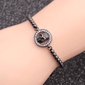 Pulsera de calavera para hombre con circonitas micro-pavé y cuentas negras - Color gunmetal