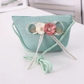 Detailed texture of mint green woven straw bag with decorative 3D fabric flowers - Bubble Flower Style / Aqua Green