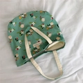 Detail of green floral cotton tote bag with beige handles and berry pattern print - Green Base Floral