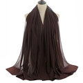 Detail showing the sheer texture and draped folds of a dark brown chiffon hijab scarf - Chocolate