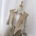 Beige and white striped knit shawl wrap accessory styled over a linen shirt - Knitted Pointed Striped Khaki