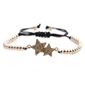 Detail of five-point star charms with colorful zircon inlay on a black braided bracelet - Mixed Color Gold Bead Chain