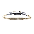 Gold beaded bracelet with black micro-pave cylinder and adjustable nylon string - Gold Curved Tube