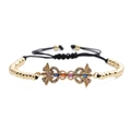 Gouden armband met zirkonia dubbele vleugel en verstelbaar zwart gevlochten koord - Caduceus Ontwerp / Goud/Zwart Touw