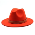 Detail of orange wool fedora hat featuring a brown leather band with white stitching - Orange Red