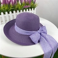 Purple straw sun hat featuring a lavender linen bow ribbon for summer beach vacations - Adjustable M (56-58cm) / Purple